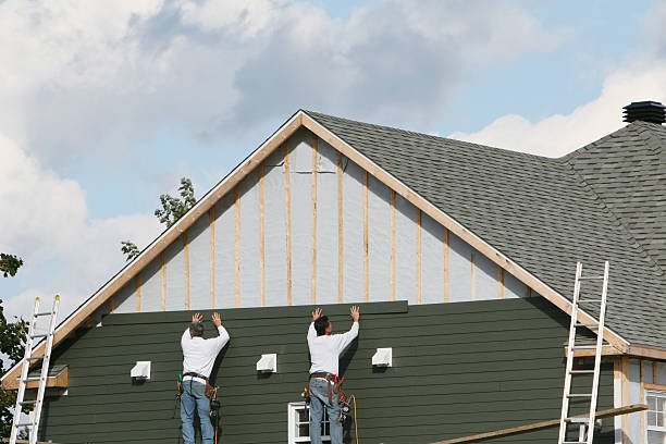Professional Siding technician working in Timnath, CO